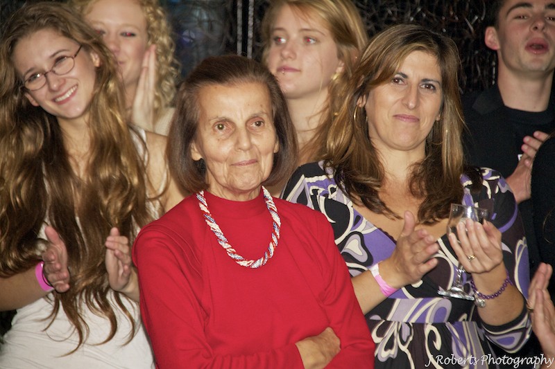 Grandmother appreciating speech - party photography sydney